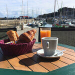 Breakfast on the terrace of the bar and café Le Mojo in Groix